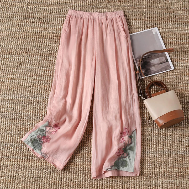 Women's lightweight floral cotton blend summer trousers, perfect for casual comfort and warm weather style.