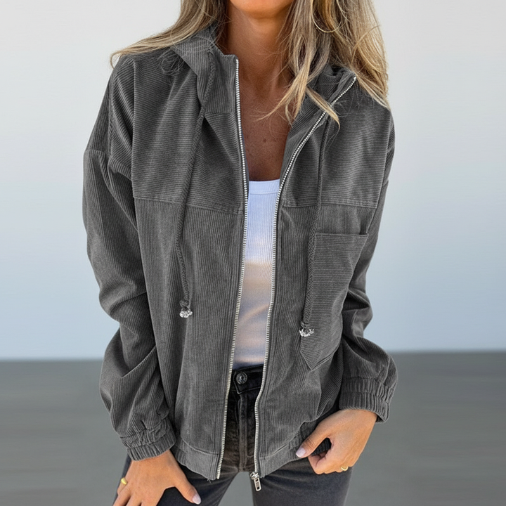 Back view of a blue Regina women's hooded jacket, showcasing its comfortable and casual design