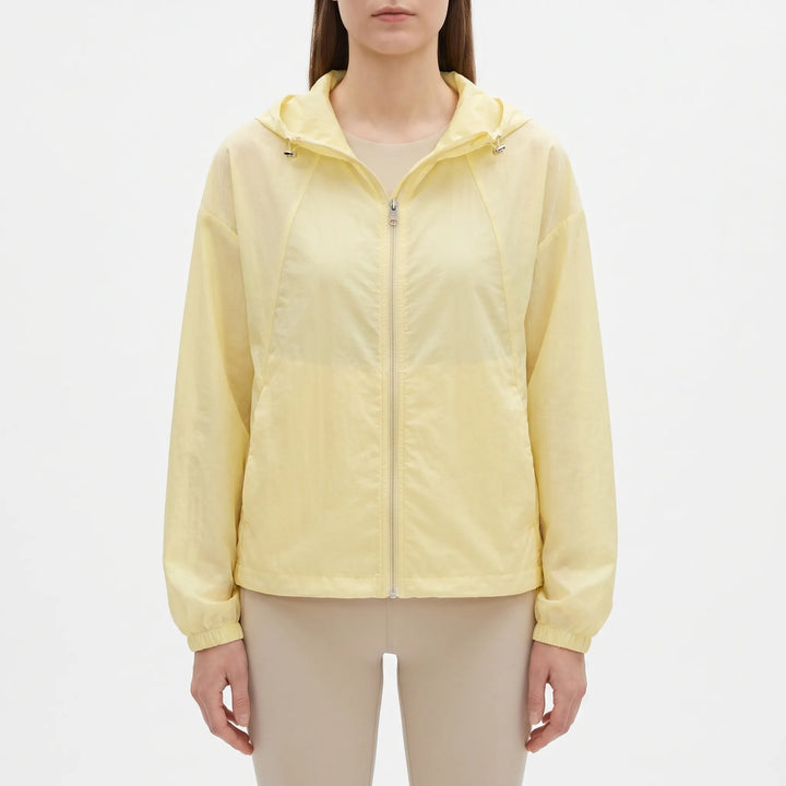 Casual women's hooded windbreaker jacket, lightweight & transitional, ideal for spring layering.