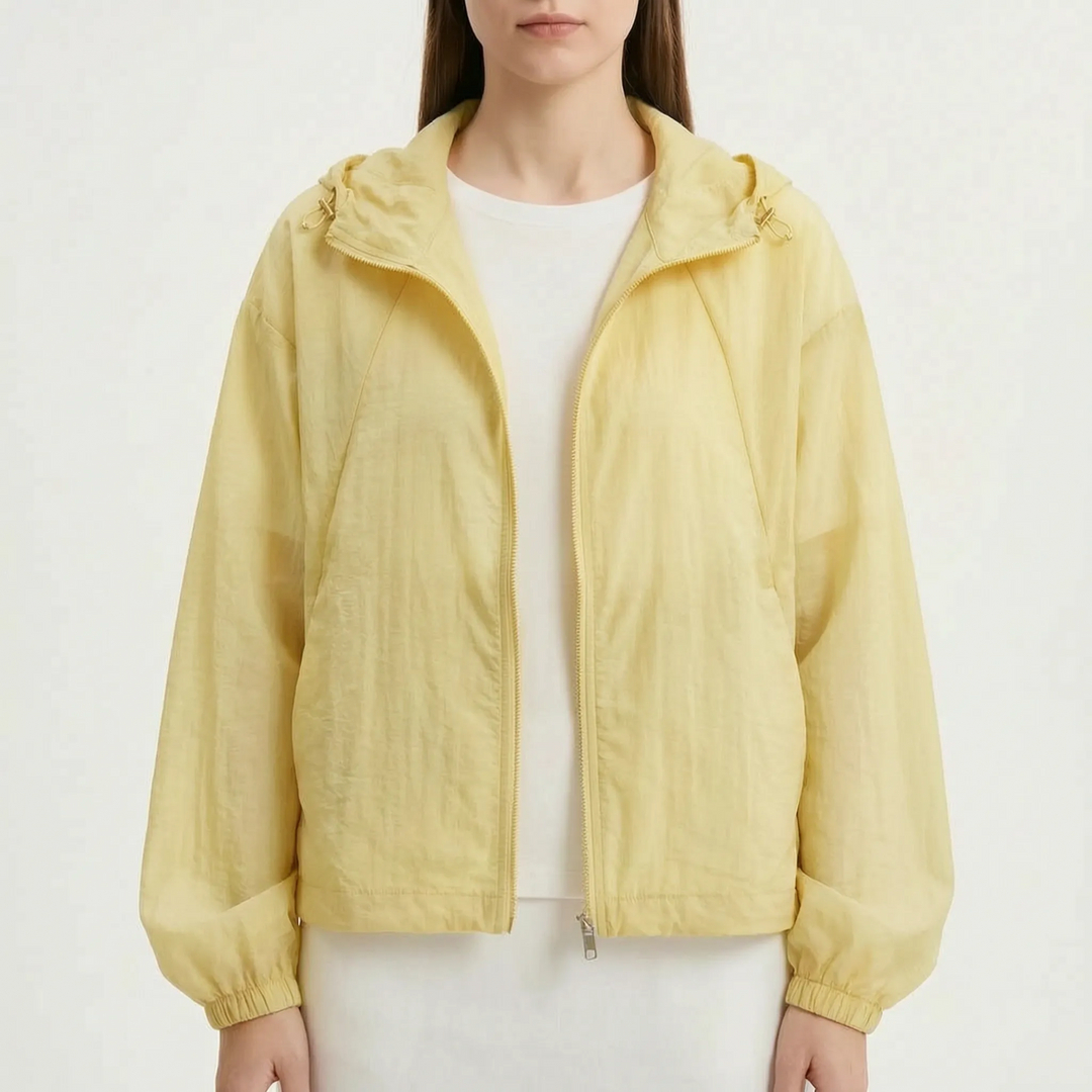 Versatile women's hooded windbreaker jacket, lightweight & colorful, perfect for transitional weather.