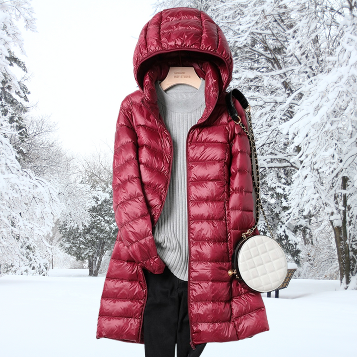 Women's lightweight insulated hooded puffer jacket, ideal for layering and winter warmth.