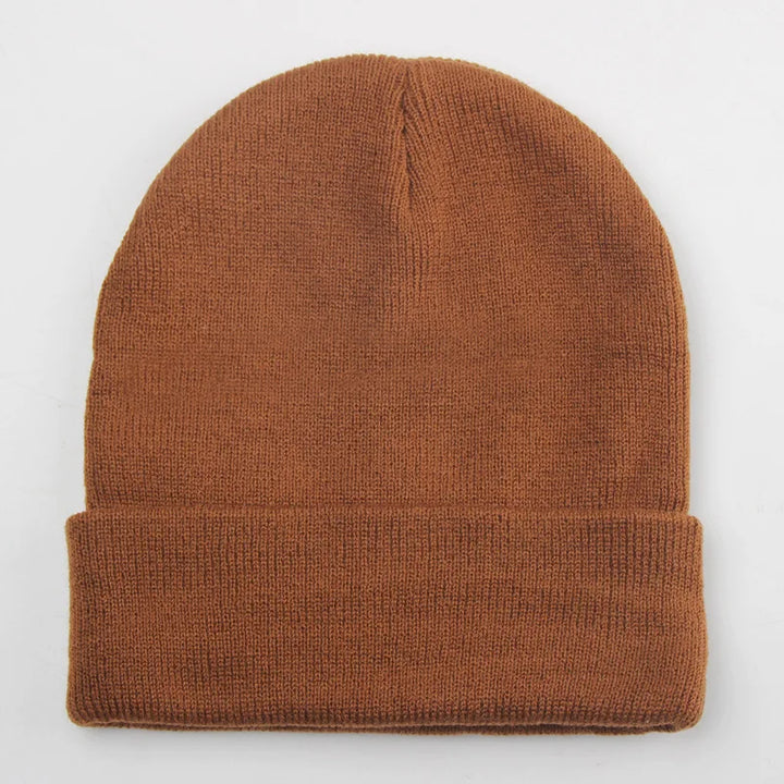 Women's winter accessory knit beanie, lightweight acrylic for warmth.