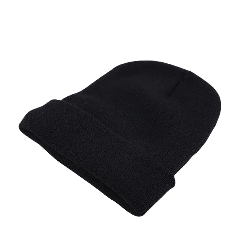 Cozy women's beanie, a lightweight knit accessory for versatile fall fashion.