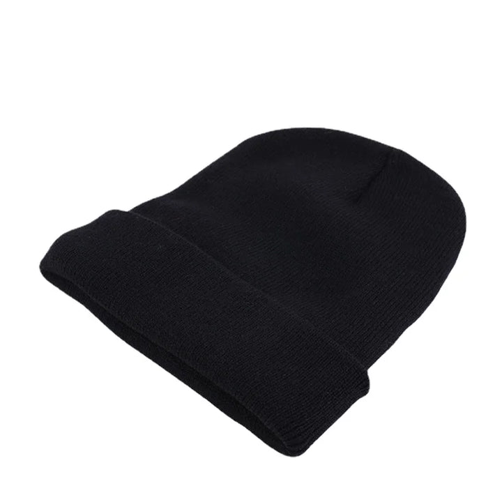 Cozy women's beanie, a lightweight knit accessory for versatile fall fashion.