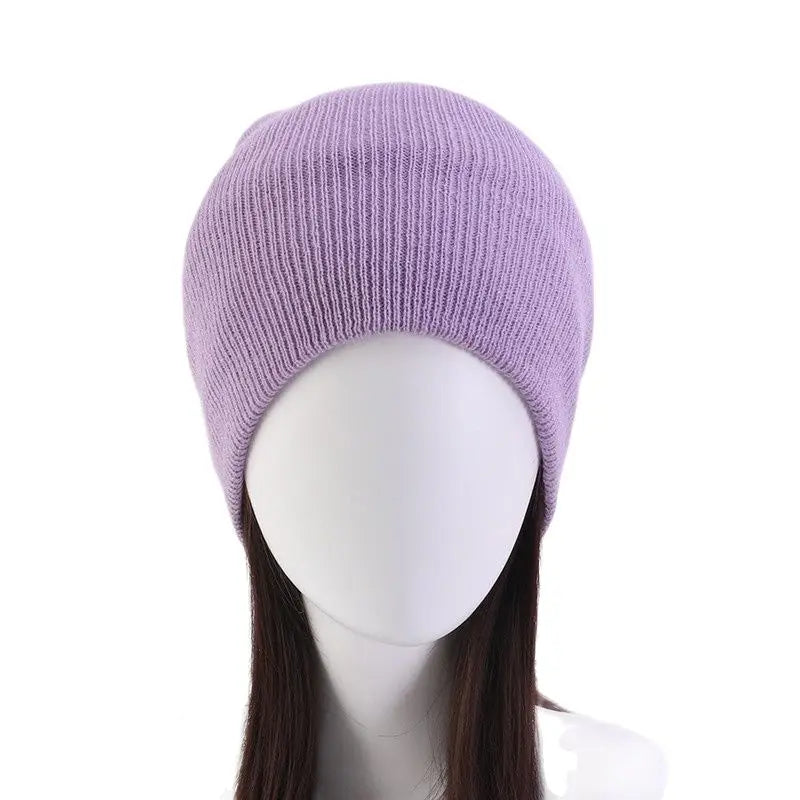 Solid color lightweight women's beanie, soft knit for fall and winter style.