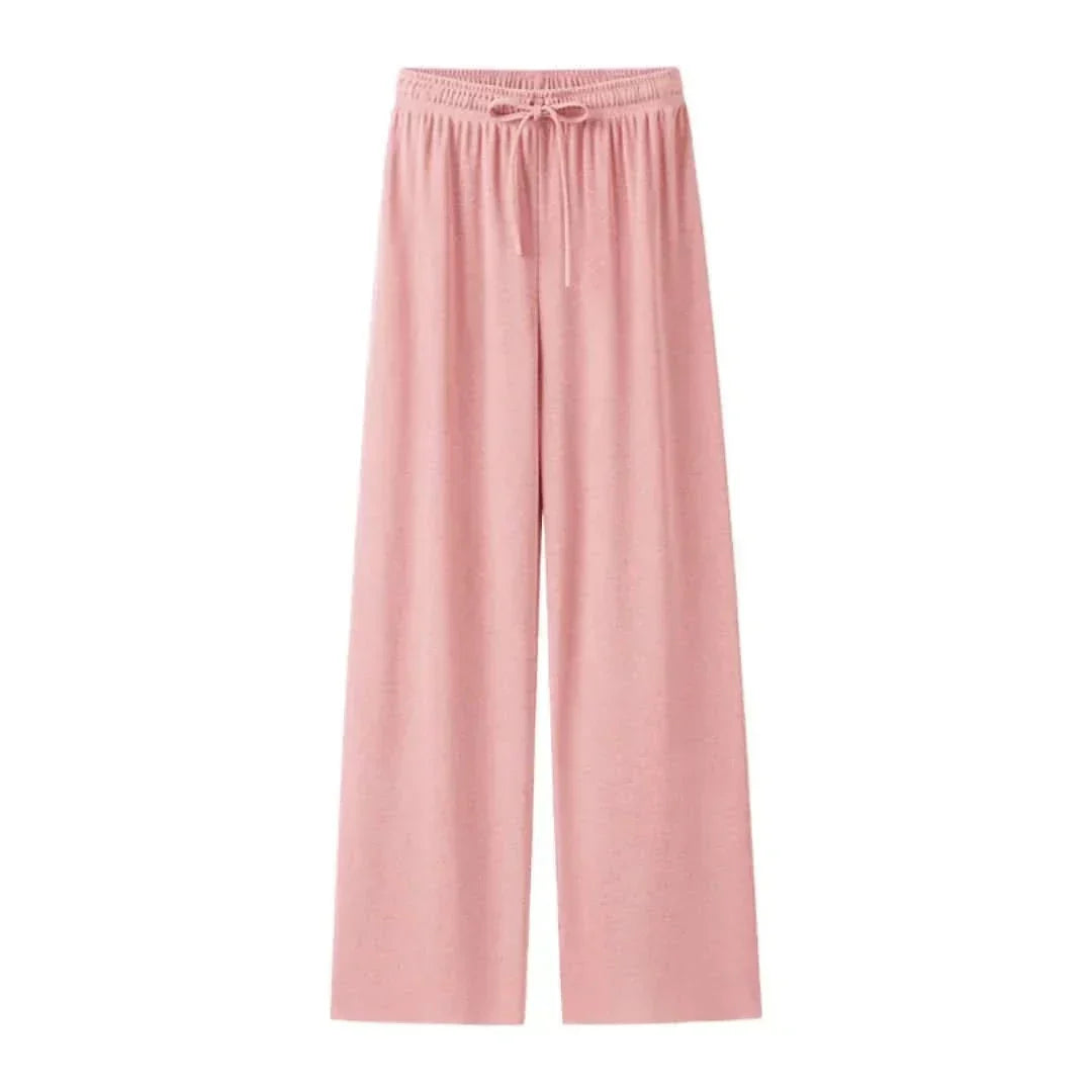 Folded women's breathable summer pants, linen blend, ready for travel