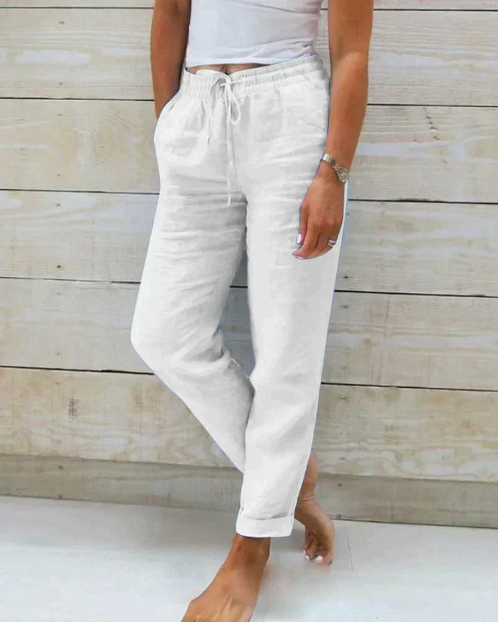 Close-up of breathable linen trousers for women. Lightweight summer pants, ideal for casual comfort.