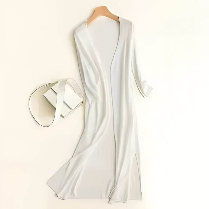 Versatile women's lightweight long cardigan, perfect layering piece for spring & fall fashion.