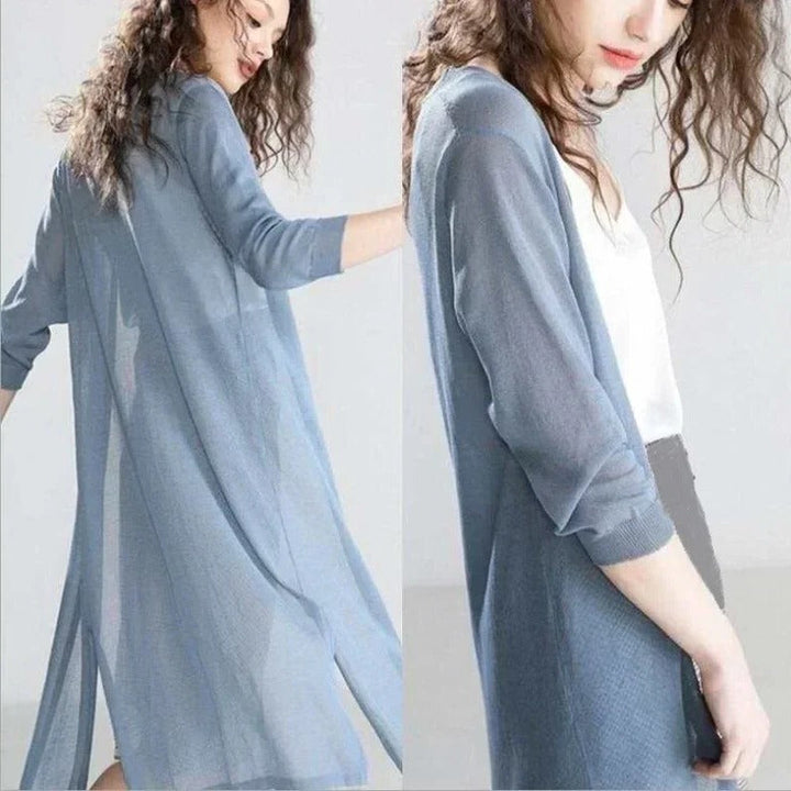 Soft women's lightweight long cardigan, a comfy open-front layering piece for everyday and seasonal style.