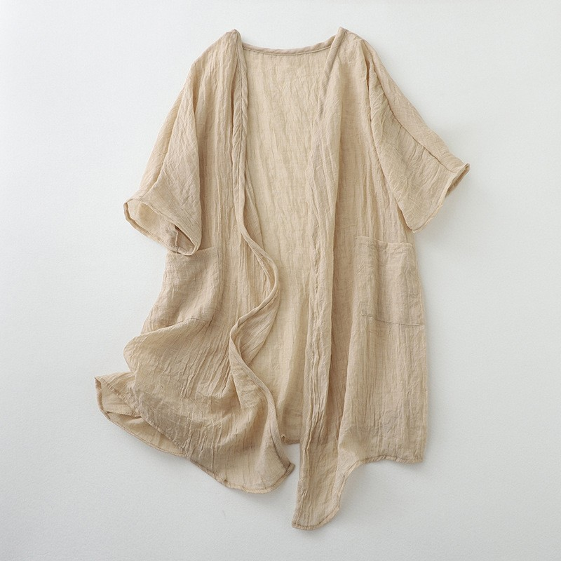 Relaxed fit women's lightweight open front cardigan with long sleeves for casual wear.