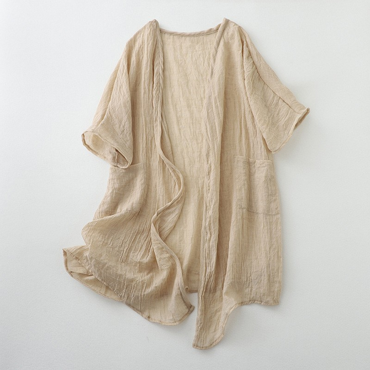 Relaxed fit women's lightweight open front cardigan with long sleeves for casual wear.