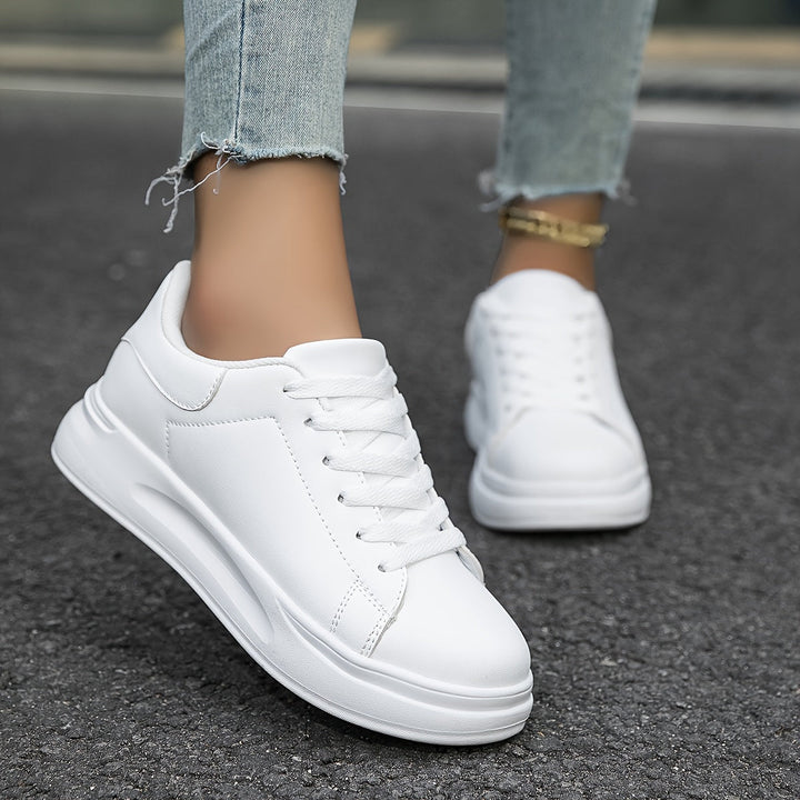 Mesh upper women's lightweight orthopedic sneakers, offering breathable support.