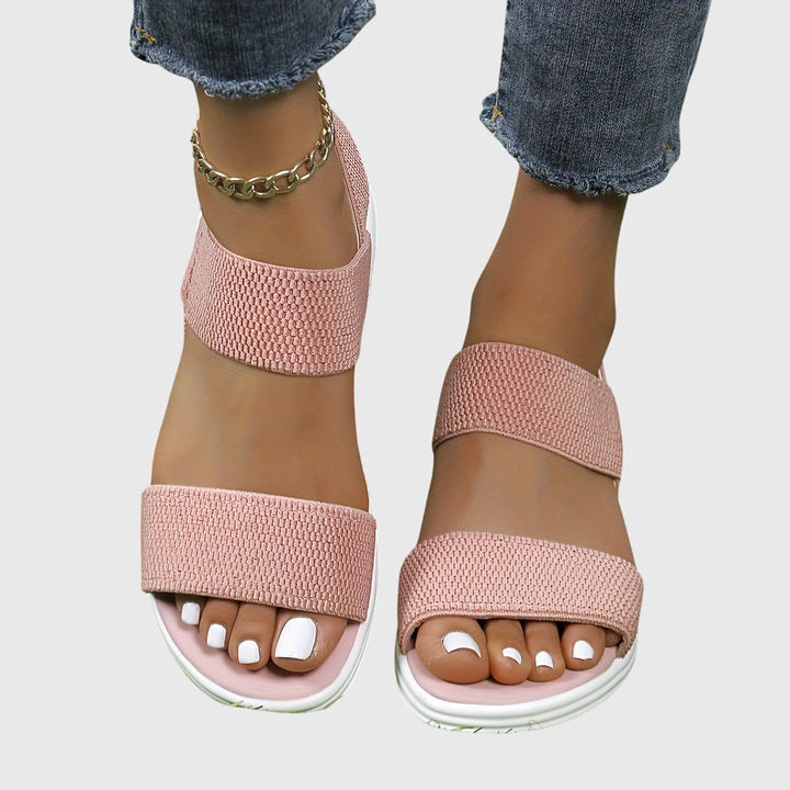 Versatile women's lightweight sandals, orthopedic, adjustable arch support for active or casual wear.