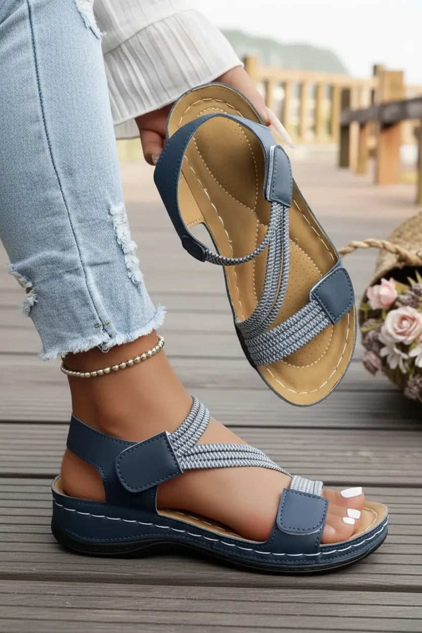 Orthopedic slip-on sandals for women, providing arch support & all-day comfort. Ideal for walking.