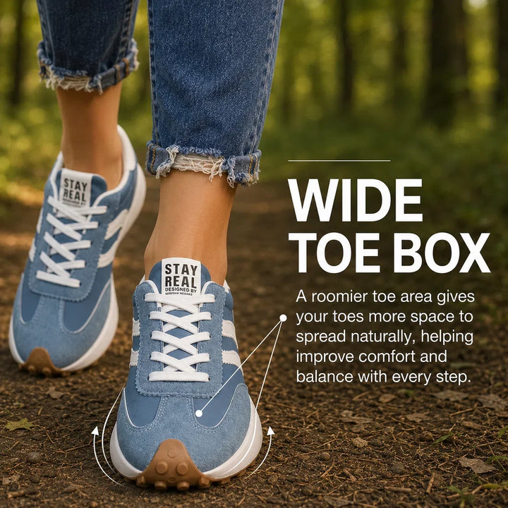Light grey women's trainers with advanced arch support for all-day comfort.