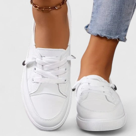 Comfortable women's walking sneakers with orthopedic arch support & lightweight breathable design.