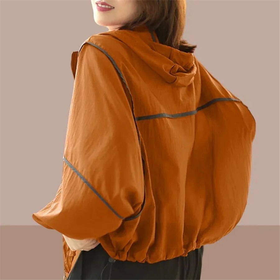 Women's lightweight oversized summer hoodie jacket in light fabric, perfect for casual spring and summer layering.