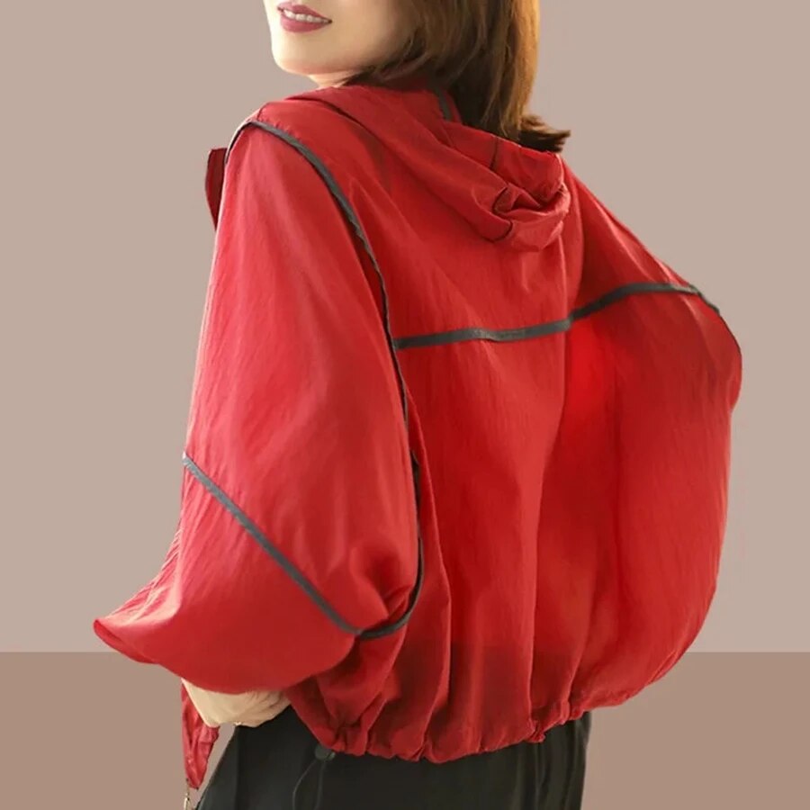 Lightweight women's summer hoodie jacket, airy fabric, great for spring/summer outerwear. Features a practical hood.