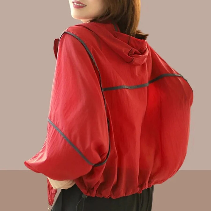 Lightweight women's summer hoodie jacket, airy fabric, great for spring/summer outerwear. Features a practical hood.