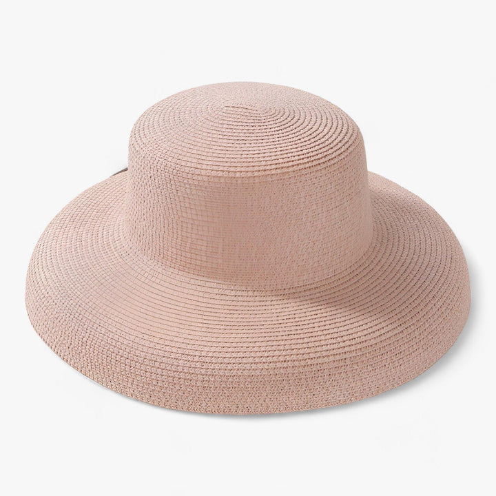 Stylish women's lightweight Panama hat providing sun protection, great for vacation