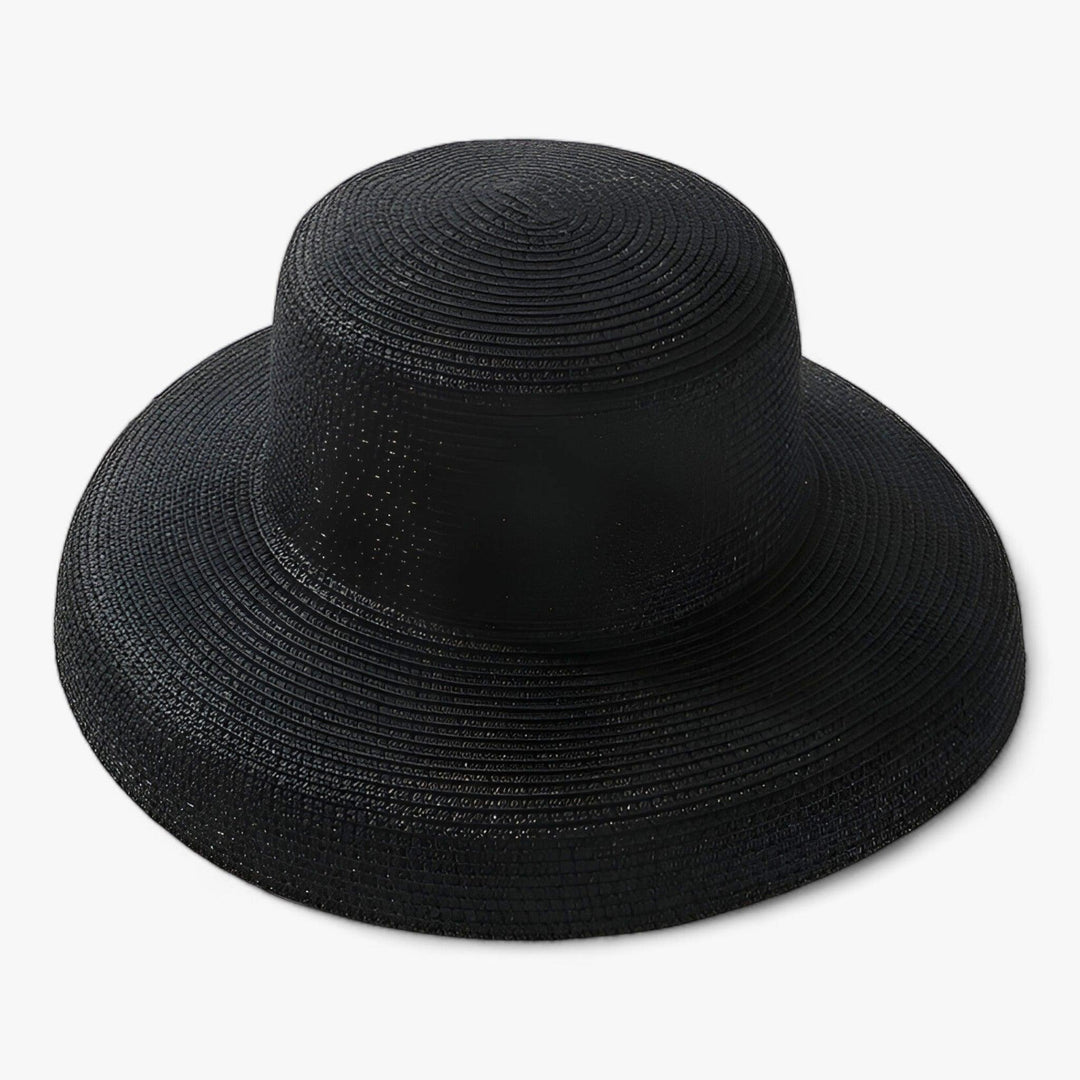 Elegant women's summer Panama hat in straw, a fashionable beachwear accessory
