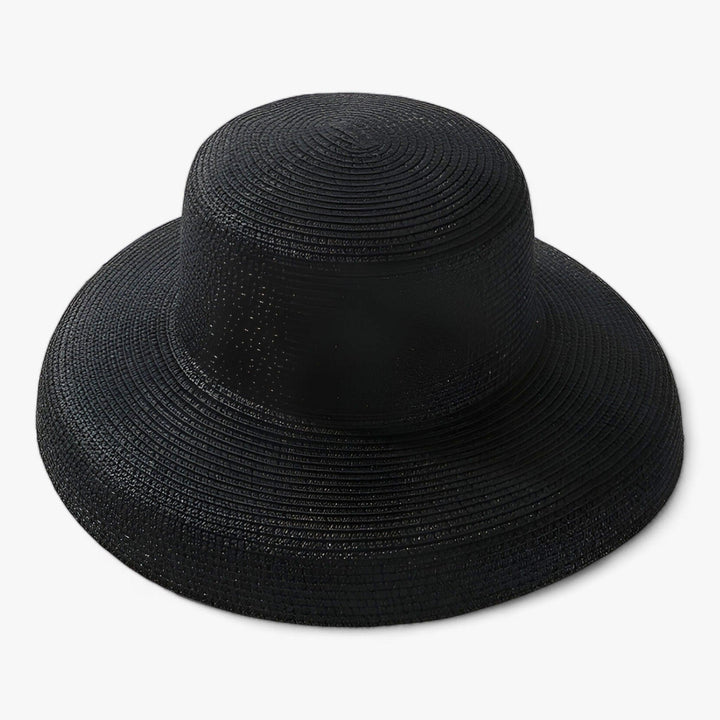 Elegant women's summer Panama hat in straw, a fashionable beachwear accessory