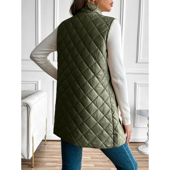 Cream women's lightweight quilted vest, a cozy and stylish addition to any outfit.
