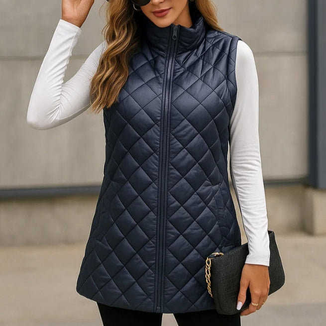 Versatile navy quilted vest for women, ideal for outdoor activities or urban layering.