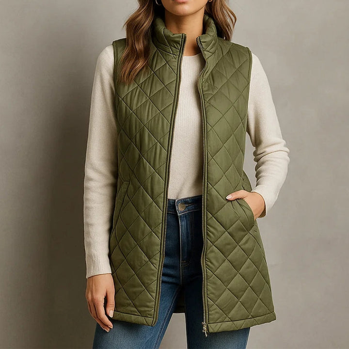 Navy women's casual quilted vest, perfect for layering over long sleeves or sweaters.
