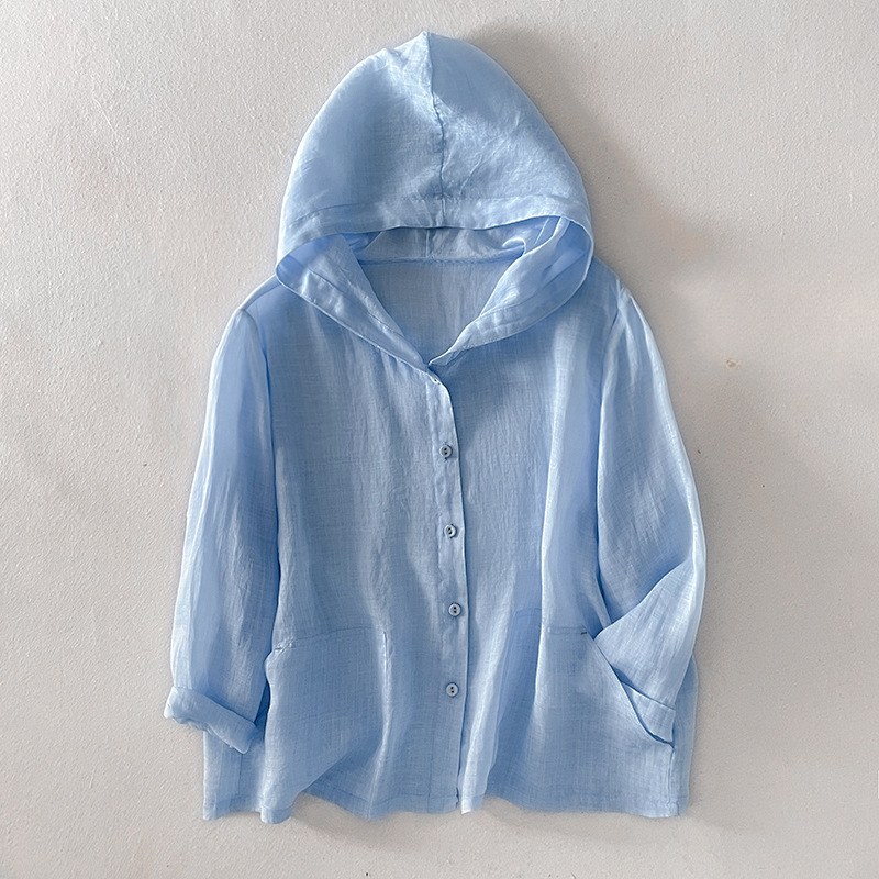 Breathable button front women's summer hoodie, ideal as a comfortable beach cover-up or vacation wear.