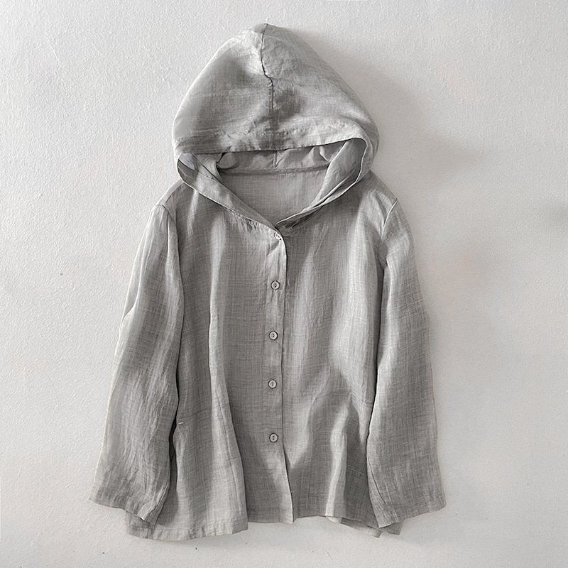 Women's relaxed fit lightweight hoodie, comfortable layering piece for casual summer days or beach outings.