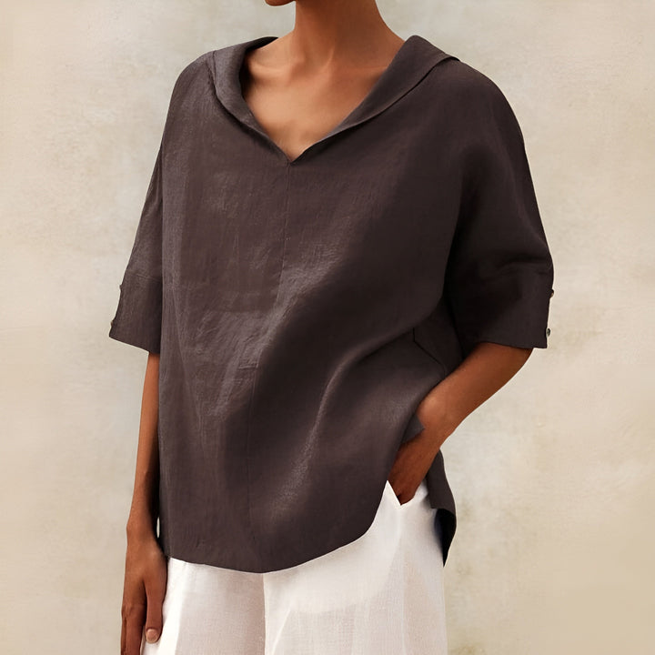 Chic women's short sleeve summer blouse, lightweight and versatile for casual everyday fashion.