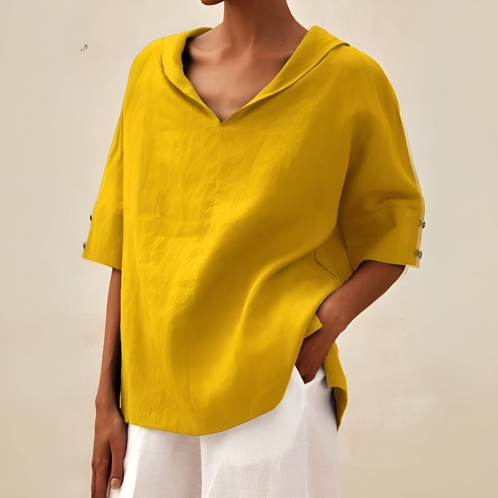 Versatile women's short sleeve blouse, a lightweight and chic basic for everyday comfort and style.