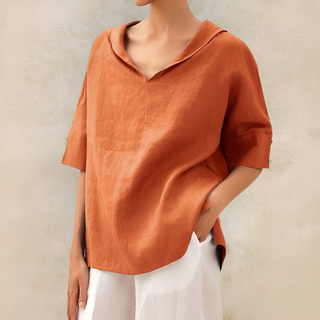 Soft lightweight women's short sleeve blouse, a comfortable and chic top for casual everyday wear.