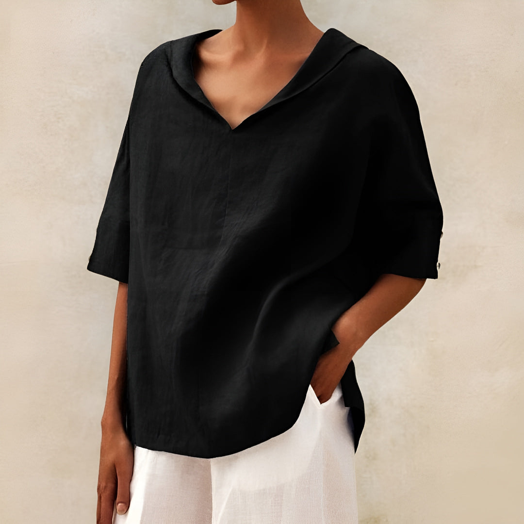 Basic yet chic women's lightweight short sleeve blouse, comfortable and versatile for everyday summer fashion.