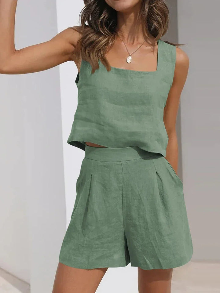 Comfortable women's sleeveless crop top and shorts combo, a lightweight outfit for summer and beach.