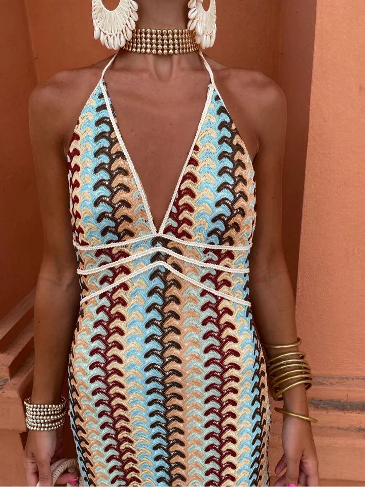 Women's lightweight sleeveless maxi beach dress in flowing white fabric, perfect for summer vacation resort wear.