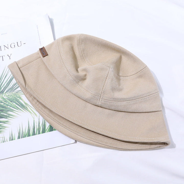 Close-up of a women's summer bucket hat with fine stitch details, ideal for beach & travel