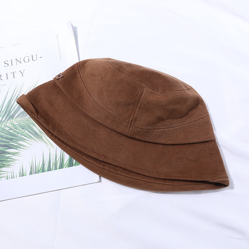 Breathable women's StitchShade bucket hat, perfect for lightweight summer and beach fashion