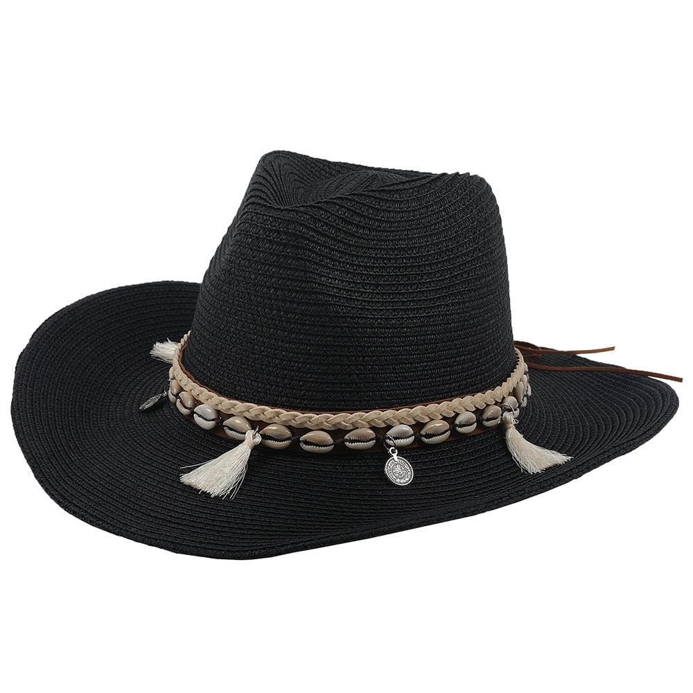 Stylish women's beach accessory: a lightweight summer hat adorned with shells and tassels for sun.