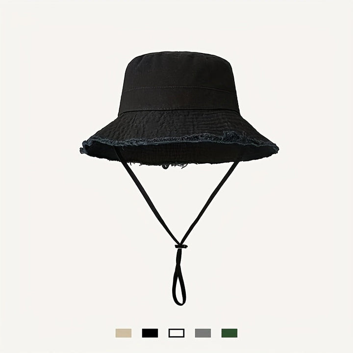 Green women's summer bucket hat with drawstring, provides adjustable sun protection for outdoor activities.