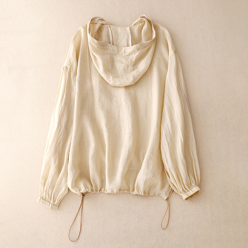 Stylish women's lightweight long-sleeve hoodie with button front, ideal for casual summer wear.