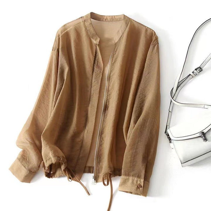 Versatile women's lightweight jacket with a stylish drawstring hem. Ideal for elegant or casual spring/summer outfits.