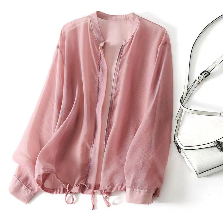 Comfortable yellow women's lightweight summer jacket with adjustable drawstring hem. Relaxed spring outerwear.