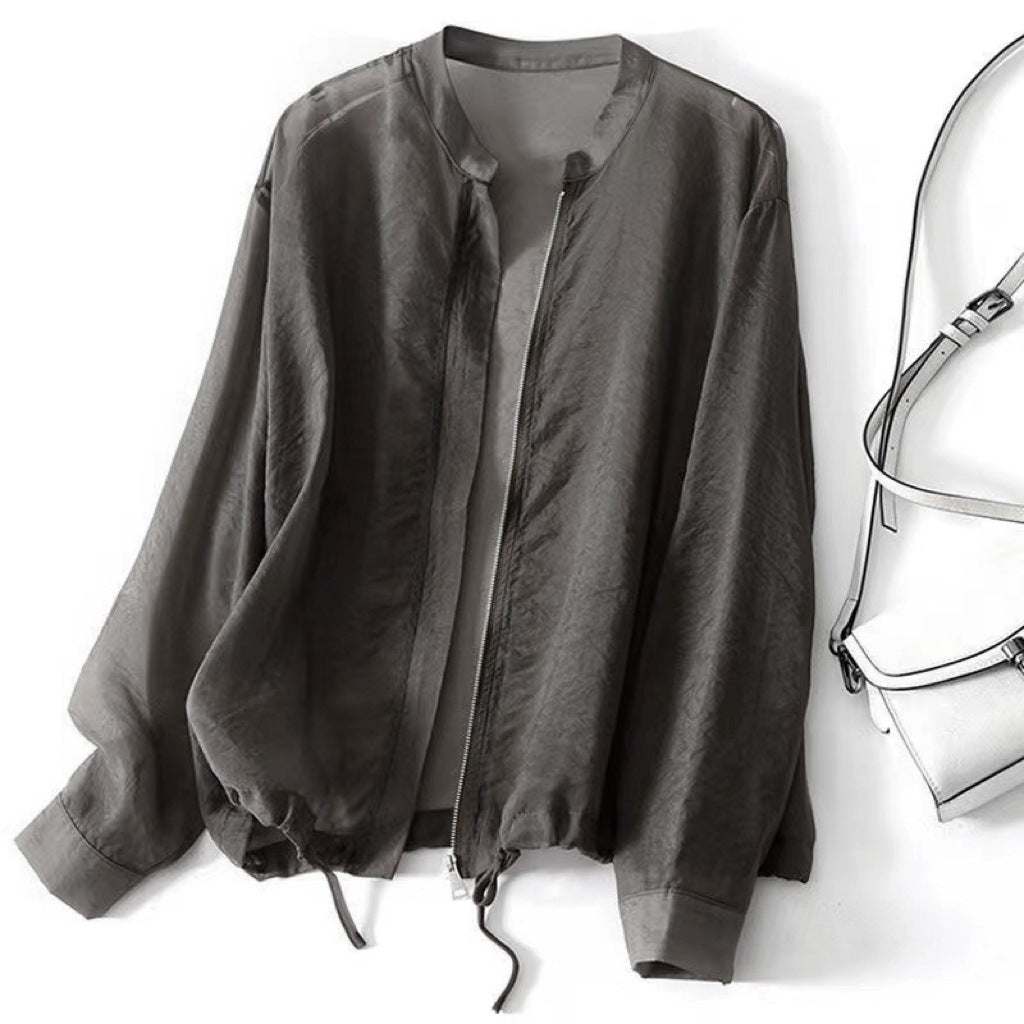 Relaxed fit pink women's lightweight jacket, perfect for summer outerwear. Features a versatile drawstring hem.