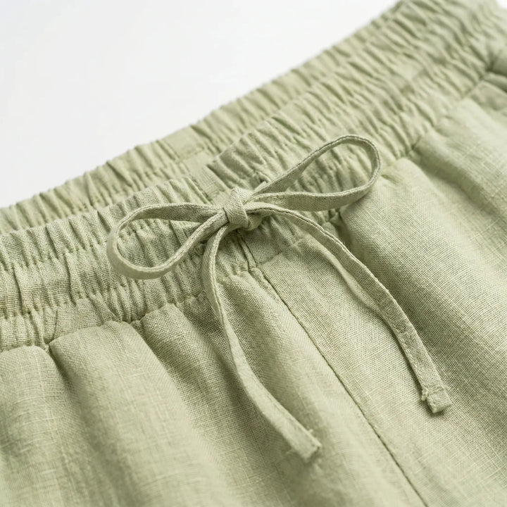 Effortless women's drawstring pants: lightweight summer style, tapered ankle-length, ideal for relaxed fit comfort.