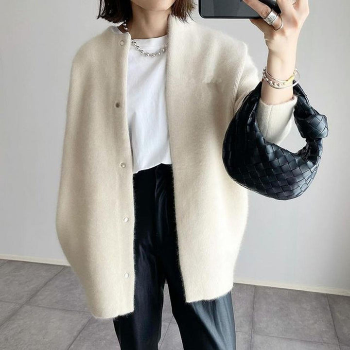 Chic open-front women's summer vest, crafted from Egyptian fabric for lightweight, breathable comfort.