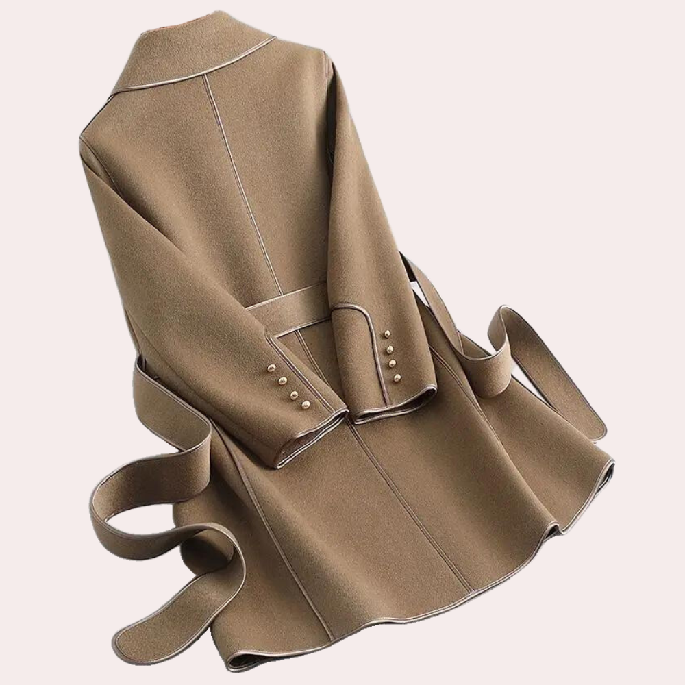 Stylish women's trench coat, lightweight outerwear ideal for a casually elegant daytime spring or fall look.