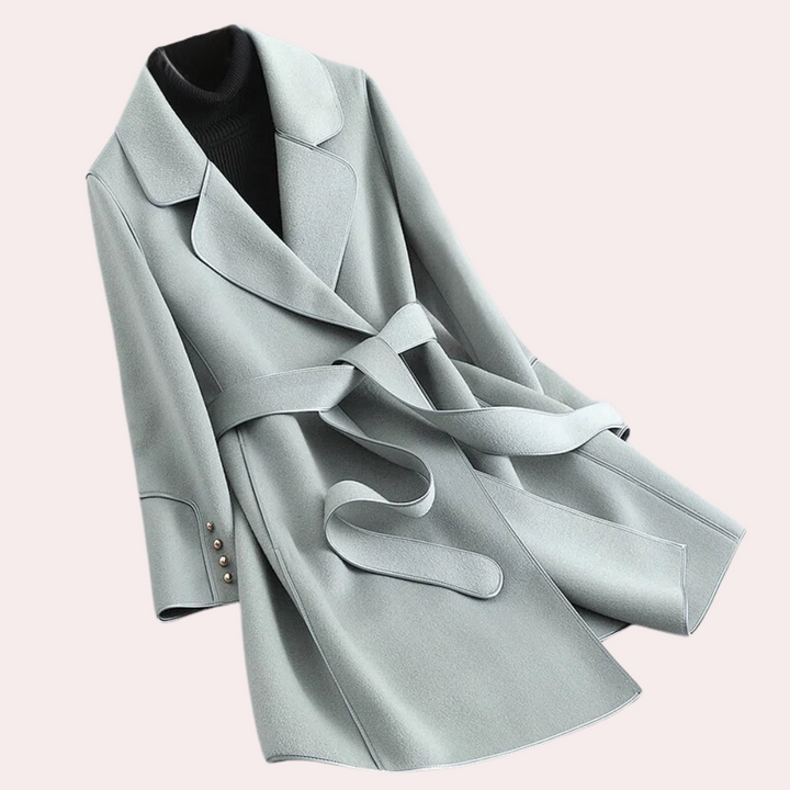 Versatile women's lightweight trench coat, offering day-to-night style, a must-have long jacket for any season.