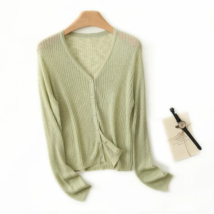 Versatile women's lightweight V-neck cardigan, ideal for spring & fall layering. Soft, comfortable everyday sweater.